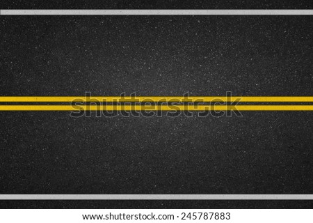 Double yellow lines on asphalt road