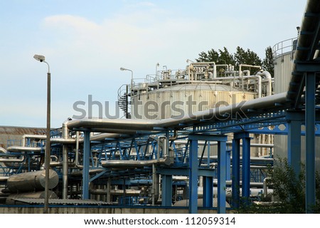 Chemical industry, truck with fuel tank and industrial storage site