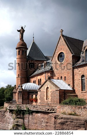 Dark clouds after storm above Mont Sainte-Odile Abbey in Alsace, France. Vosges Mountains.