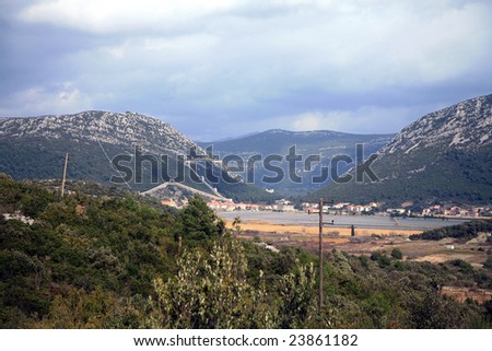 View on Ston with defensive wall and salt-works, historic Roman town in Croatia. Peljesac peninsula.