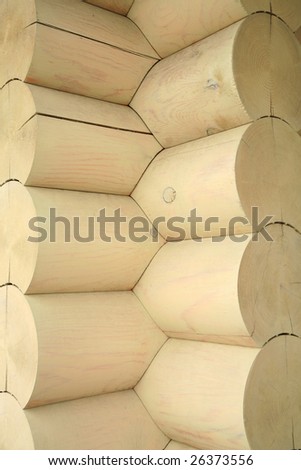 Wall of country wooden house. Construction\'s details of the log house.