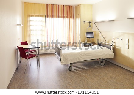 Hospital room in the hospital with bed and table
