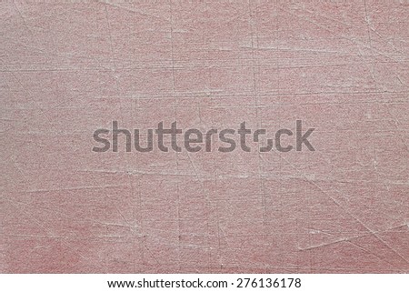 Red paper with cuts and scratches grit