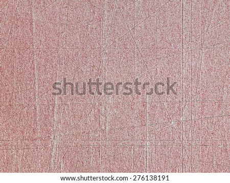 Pink paper with cuts and scratches