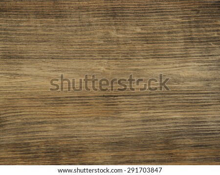 Tabletop old board as background brown with grain