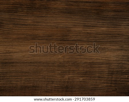 Tabletop old board as background dark brown fir
