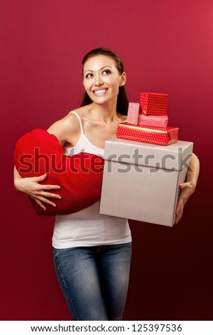 Attractive Asian Mixed Woman smiling happily with heart and gifts