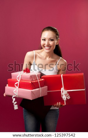 Attractive Asian Mixed Woman with gifts on both hands
