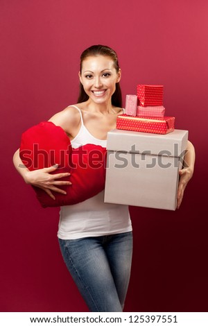 Attractive Asian Mixed Woman with gifts and a heart