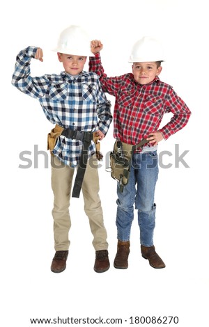 Two tough boys wearing construction hats belts