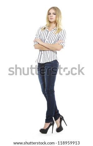 Confident blonde woman in blouse clothing, standing with hands folded against white background