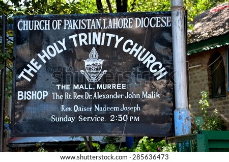 Murree, Pakistan - September 23, 2012: A sign at Murree\'s Holy Trinity Church, a part of the Church of Pakistan. Christians form a small minority in Pakistan\'s population, mainly in Punjab province.