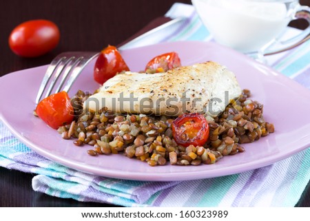 White fish fillet of perch, cod with vegetables and lentils, tomatoes, diet food