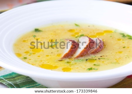Cream soup of red lentil with smoked meat, duck, chicken, garlic, dietary oriental dish with spices