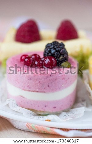 Pink cake with mousse from berries, diet dessert