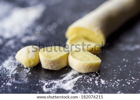 Cooking Italian pasta orecchiette, yellow dough, home kitchen