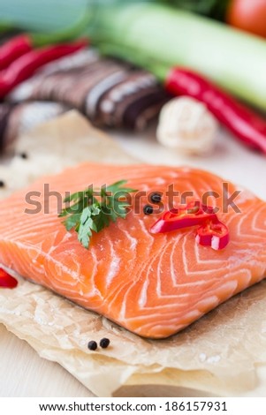 Raw fillets of red fish, salmon, cooking healthy diet dishes for dinner