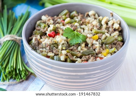 Stew with pearl barley, vegetables, minced meat, herbs, homemade delicious dinner