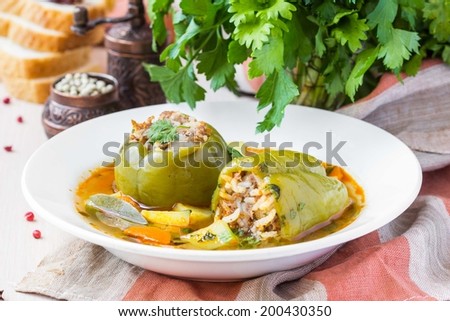 Soup with peppers stuffed meat and rice, potatoes, dolma shurpa, sorba, oriental traditional dish