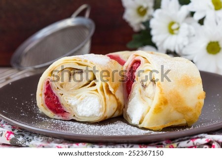 Tasty pancake rolls with three toppings, cheese, strawberries, banana, Shrovetide