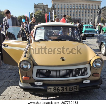 Voronezh, Russia - September 20, 2014: city dwellers look round East Germany retro car Trabant 601 Limousine Standart on the city central square during the celebration of the City Day