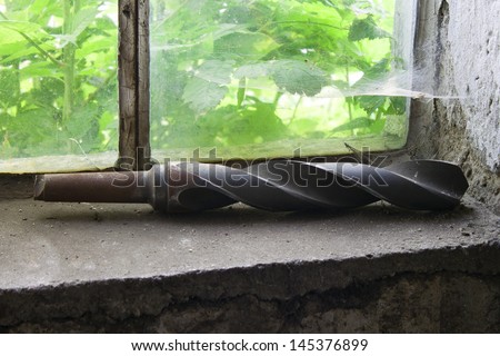 Old drill on a Window Ledge