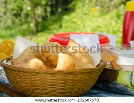 Indian snack Samosa on a Summer outdoor Party