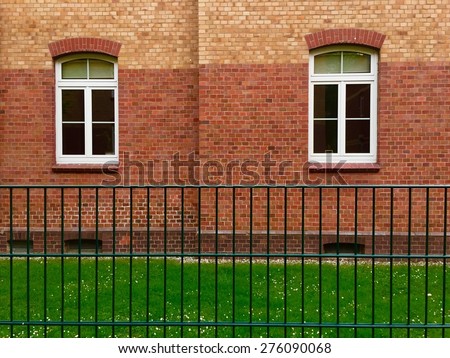 Fence Grass and Old German House Windows