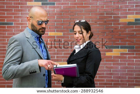 Business Man and Woman Working Outdoor