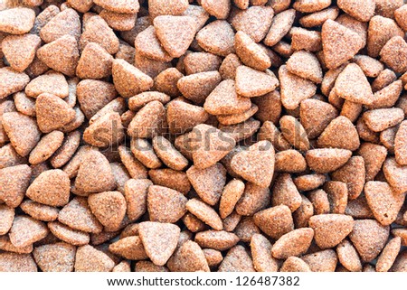 Brown pet food texture. Useful for backgrounds.