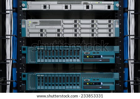 Server computer and Digital media manager install on rack in datacenter room.