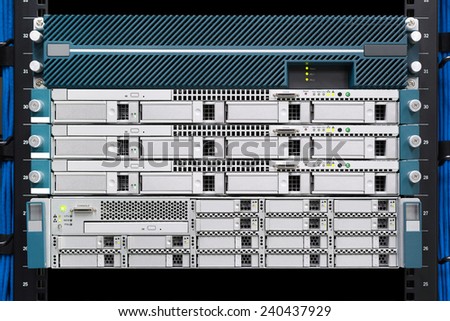 Server computer and Digital media manager install on rack in datacenter room.