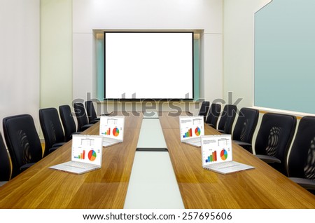 Interior conference room, meeting room, boardroom, Classroom, Office, blank projector screen and laptop.