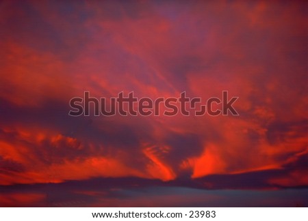 Sunrise sky cloud formation over the rocky mountains in Colorado.