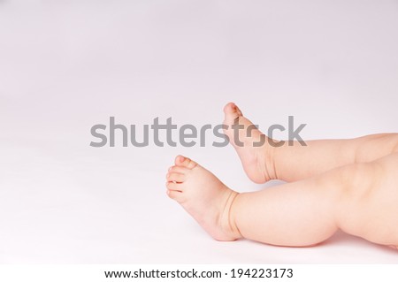Close up of baby charming small legs