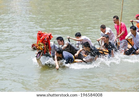 Hangzhou - June 2: the Dragon Boat Festival, xixi wetland held once a year of the dragon boat race, on June 2, 2014 in hangzhou, China. Dragon boat is state-level non-material cultural heritage