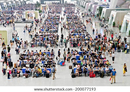 Hangzhou -  June 8: the East  train station waiting for the train  passengers in the hall, on June 8, 2014 in hangzhou, China. Hangzhou East railway station is one of the largest railway hub in Asia.