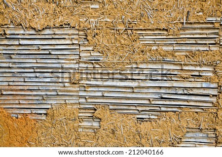 Yellow mud background texture bamboo wall