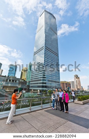 Shanghai - October 1:tourists in the Shanghai Lujiazui financial and Trade Zone , on October 1, 2014 in Shanghai. Lujiazui financial and trade zone is one of the main Shanghai financial center area.