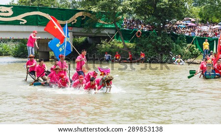 Hangzhou, China - on 20 June, 2015, hangzhou xixi wetland hold a dragon boat race to celebrate the Dragon Boat Festival, the Dragon Boat Festival is a traditional Chinese custom.