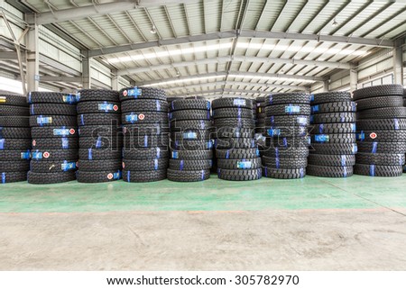 Hangzhou, China - on July 24, 2015: North train station freight warehouse goods piled up many  car tires, North train station is a large Cargo transfer station in hangzhou.