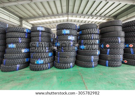 Hangzhou, China - on July 24, 2015: North train station freight warehouse goods piled up many  car tires, North train station is a large Cargo transfer station in hangzhou.