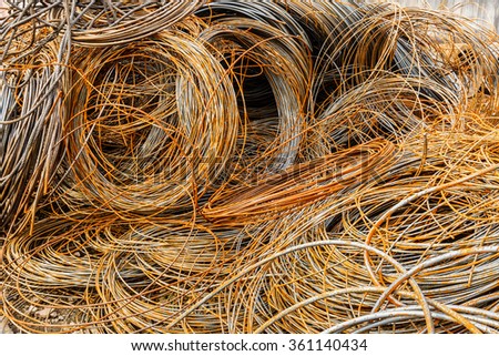 Pile up clutter rusty metal steel wire in Steel mills