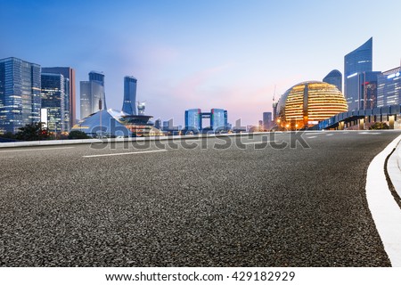 Asphalt roads and beautiful scenery of the city at night in Hangzhou