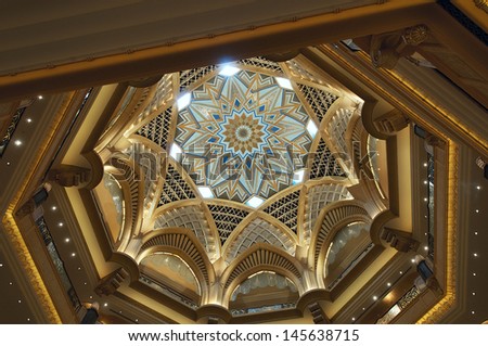ABU DHABI, UAE - MARCH 17: Dome decoration in Emirates Palace hotel on March 17, 2010. Emirates Palace is a luxurious and the most expensive 7 star hotel designed by  John Elliott RIBA.