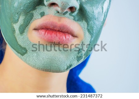 girl face mask which is surprised, on a gray background
