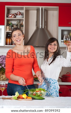 two friends cooking together