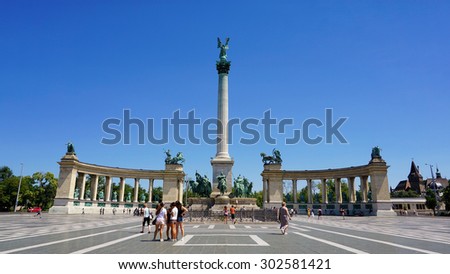 BUDAPEST, HUNGARY, JULY 11,2015: People visiting Heroes\' Square, one of the major squares in Budapest noted for its iconic statue complex.