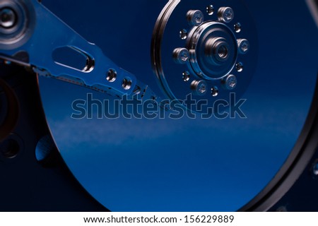 HDD Internals of a computer hard drive  with blue colors