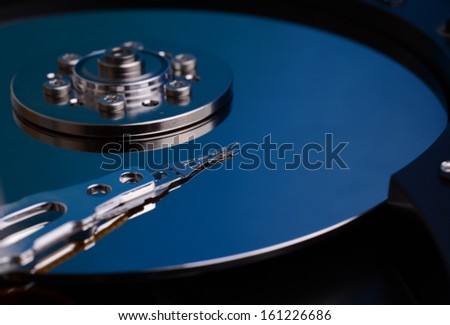 HDD Internals of a computer hard drive with blue colors